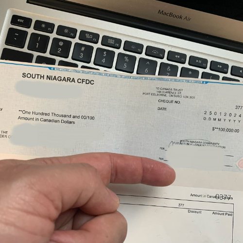 100K Cheque Blurred